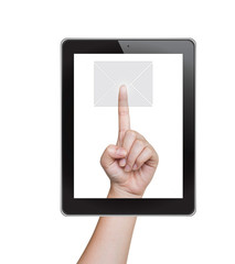 Hand pushing mail button of tablet on a touch screen