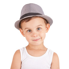 Cool stylish little boy in a hat. Isolated on white