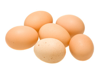 Six organic eggs isolated on white