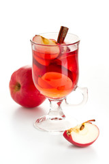 Hot red drink with apple and cinnamon