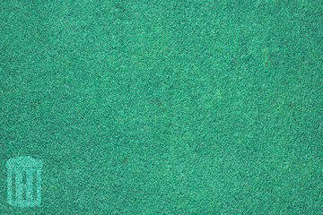 Fototapeta premium Trash on blue grass texture and background