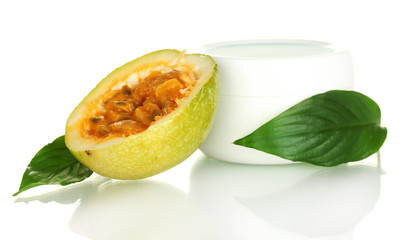 green passion fruit with cosmetic cream isolated
