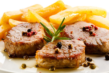 Grilled steaks with French fries