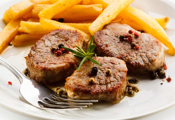 Grilled steaks with French fries