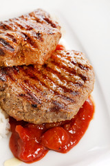 Grilled pork steak with pear