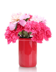 Bouquet of carnations and peonies in a vase isolated on white