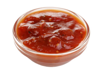 Tasty ketchup in bowl isolated on white