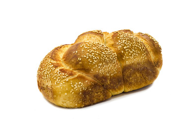 Loaf of challah bread isolated on white background