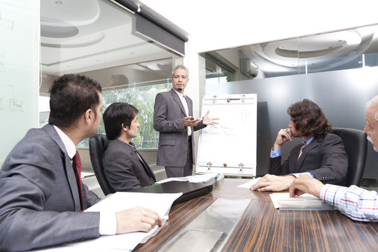 young businessman giving presentation