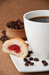 Breakfast with coffee and croissants 