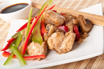 Stir fry chicken with sweet peppers and mushrooms 