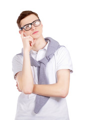 Portrait of a young man looking up, isolated on white background