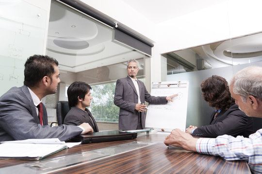 young businessman giving presentation