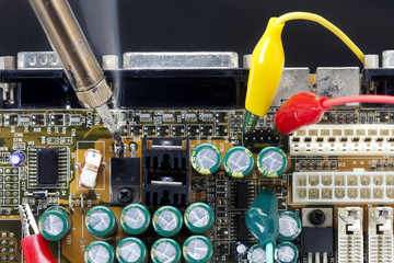 Soldering iron on electronic circiut board