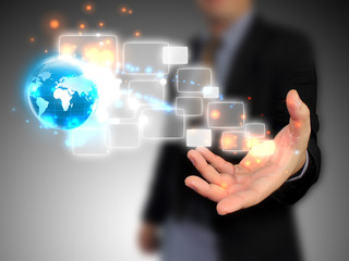 businessman holding a glowing, connected