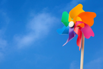 Color windmill under blue sky