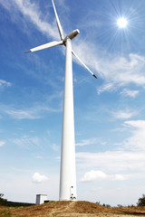 Wind turbines on hight sky.