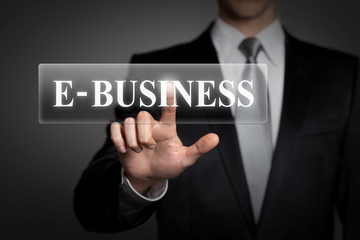 businessman pressing virtual button - E-business