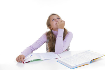 Schoolgirl studing the lesson