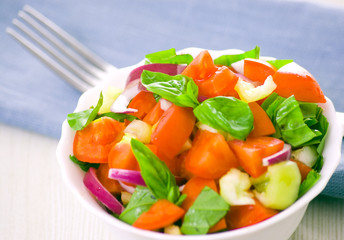 fresh vegetable salad with basil