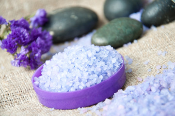 Spa concept. Lavender salt and purple flowers 
