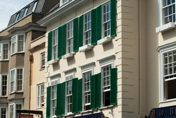 Oxford shuttered windows above Blackwell's on broad street