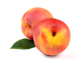 Fresh Peach Fruits with Green Leaves Isolated on White