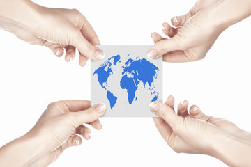 Puzzle pieces and human hand