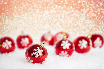 Christmas balls on snow