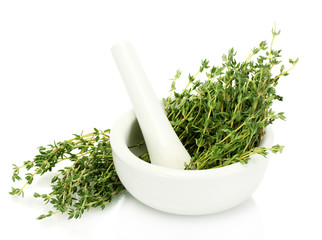 mortar with fresh green thyme isolated on white - obrazy, fototapety, plakaty