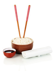 Bowl of rice and chopsticks isoalted on white