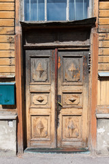 old door and window of wooden building