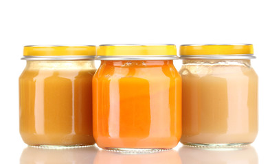 Jars of baby puree isolated on white