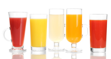 Tropical juices in glasses isolated on white