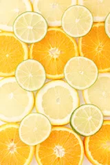 Papier Peint photo Lavable Tranches de fruits Orange citron vert et citron se bouchent