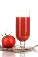 Tomato juice in glass isolated on white