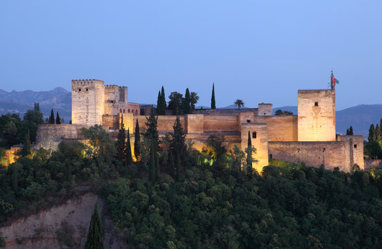 Alhambra illuminated at dusk. Granada, Andalusia Spain