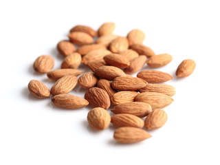 Dried almonds on a white background