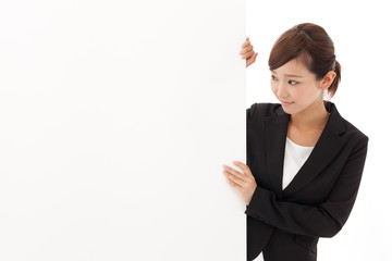 a young businesswoman with blank whiteboard