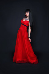 beautiful young woman in red long dress