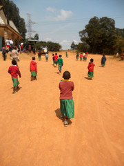 African Children go to church in the village Pomerini of  the Fr