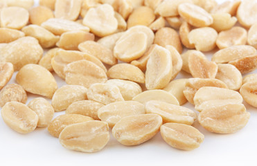 Salted peanuts on white