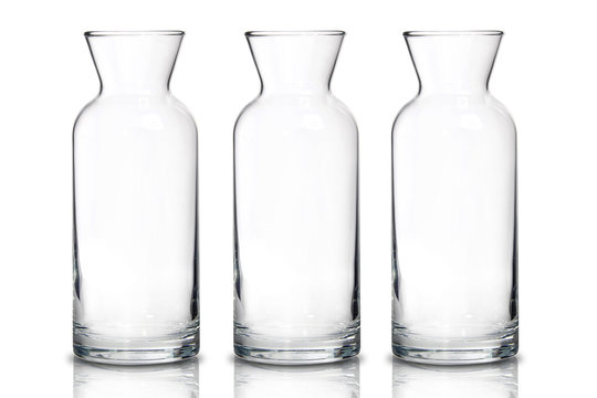 Tall Transparent Glass Jug On White Background