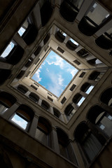 View from below to the house's windows. Venice, Italy.