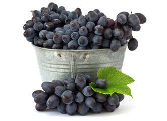 Fresh grape in metallic can isolated on white background