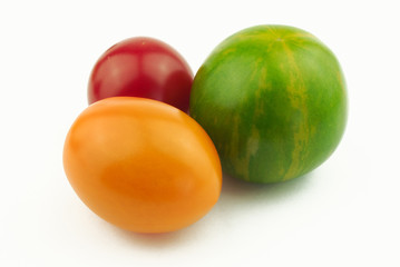 Three different tomatoes