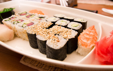 Set of sushi rolls on the white plate