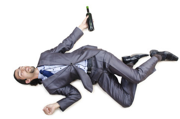 Drunk businessman on the floor