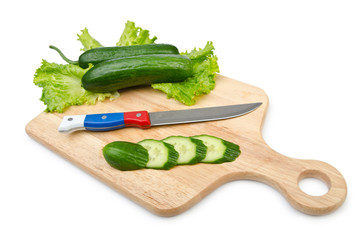 Tomatoes and cucumbers on white