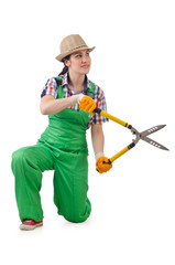 Girl with garden scissors on white